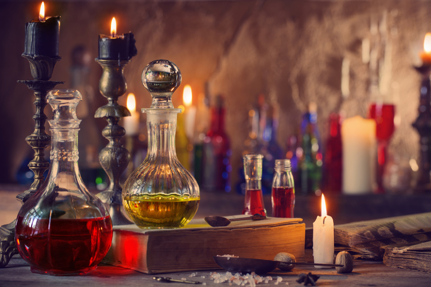 Magic potion, ancient books and candles